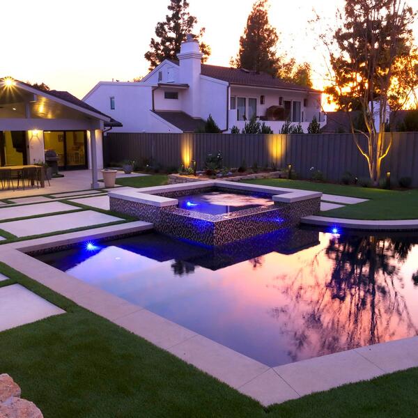 Contemporary Entertainers Pool With Beautiful Lighting